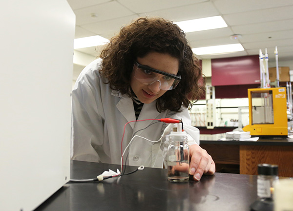 Sarah Schneider at work in the lab.